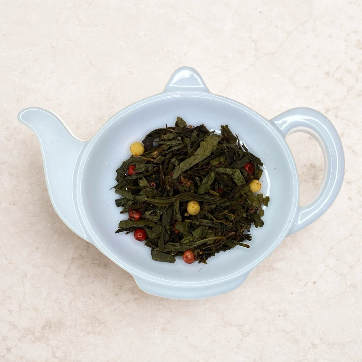 Carstensens Tehandel Grøn Chili Trøffel te (100 g) – løs grøn te med kakao, hvid chokolade, rosa peber og mild chili, fyldig dessertte med bløde karamelnoter