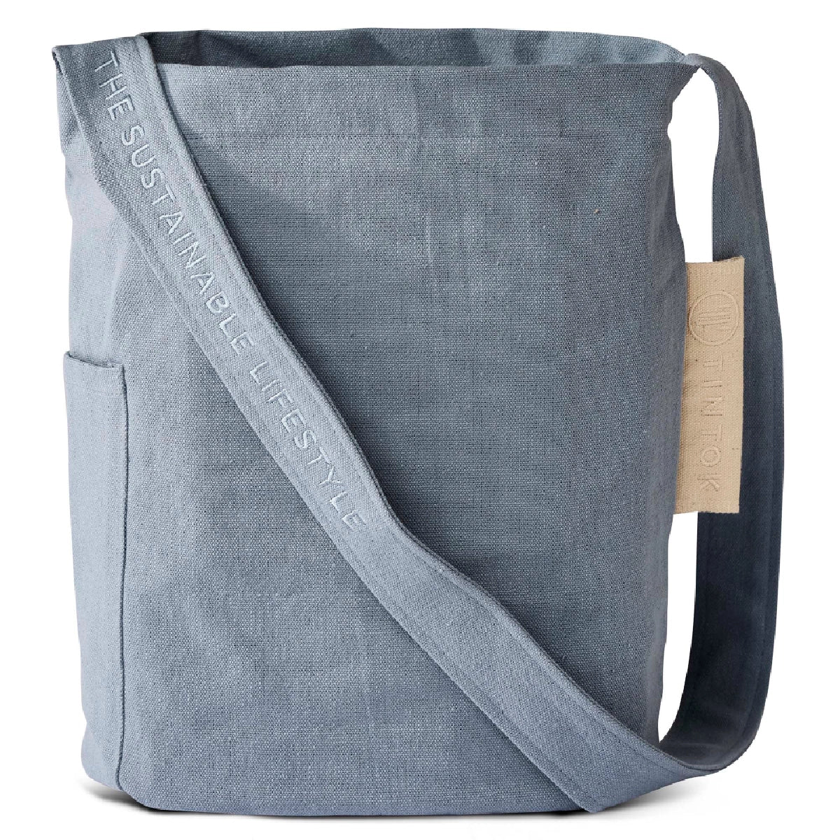 Tintok Mira Canvas Taske i farven Ashley Blue – rummelig canvas skuldertaske/crossbody i 100% økologisk bomuld, GOTS-certificeret, med udvendig og indvendig lomme samt rem med tone-i-tone broderi