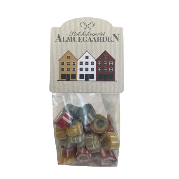 Almuegaarden HUSE bolcher, blandede håndlavede bolcher med smag af hindbær, passionsfrugt og hyldeblomst i pose med husmotiv, 110 g