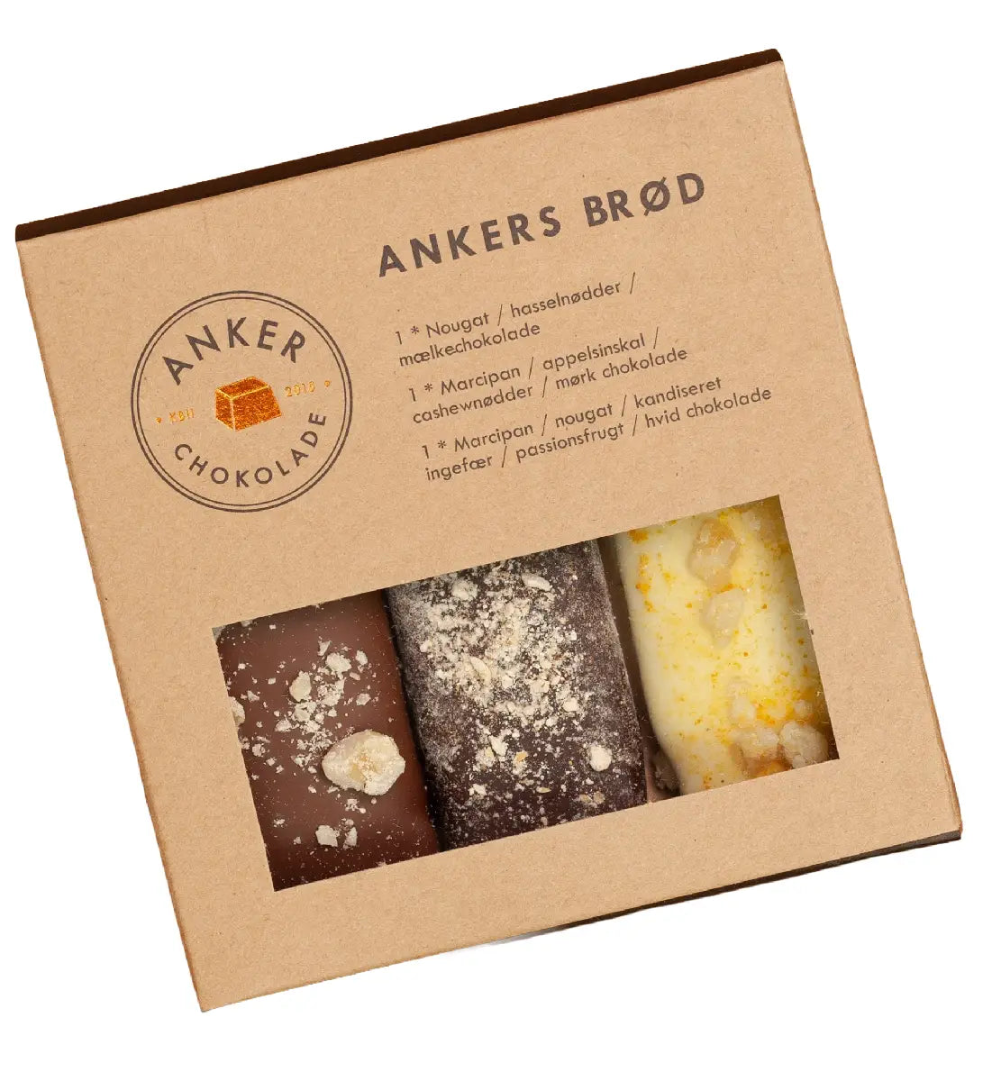 Anker Chokolade Ankers Brød 3 stk ØKO 135 g – pakke med tre varianter: nougatbrød i mælkechokolade med hasselnødder, marcipan/nougatbrød i hvid chokolade med kandiseret ingefær og passionsfrugt samt marcipanbrød i mørk chokolade med cashewnødder og appelsinskal