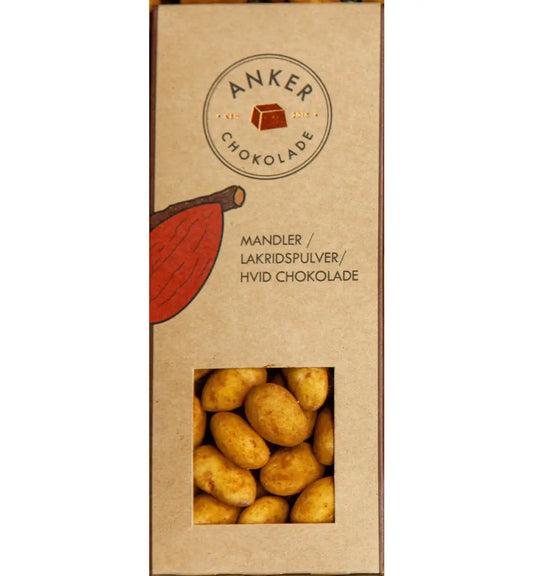 Anker Chokolade økologisk dragée 105 g – Valencia-mandler overtrukket med hvid chokolade og lakridspulver, sprød mandelkerne og cremet chokolade med lakridssmag, opbevares køligt