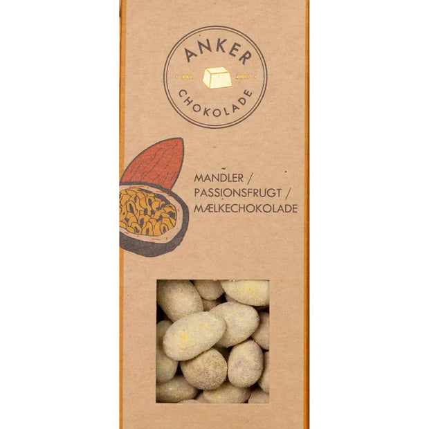Anker Chokolade dragée 105 g med Valencia-mandler overtrukket med mælkechokolade og passionsfrugt – økologiske chokoladedragéer med sprød mandelkerne og frisk frugtnote