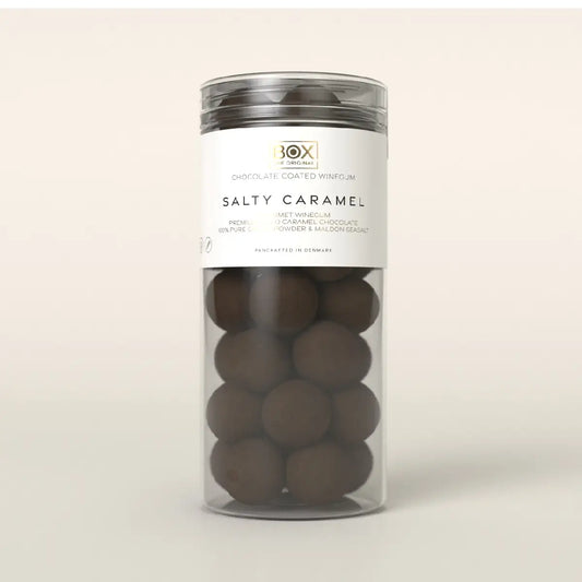 Box The Original Salty Caramel Tube Large 250 g med gelatinefri mango-vingummi, hvid karamelchokolade, kakaopulver og Maldon sea salt