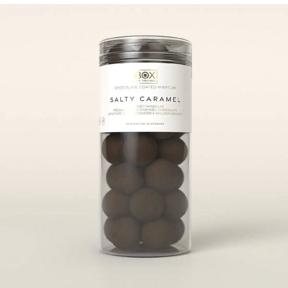 Box The Original Salty Caramel Tube Large 250 g med gelatinefri mango-vingummi, hvid karamelchokolade, kakaopulver og Maldon sea salt