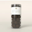 Box The Original Salty Caramel Tube Large 250 g med gelatinefri mango-vingummi, hvid karamelchokolade, kakaopulver og Maldon sea salt