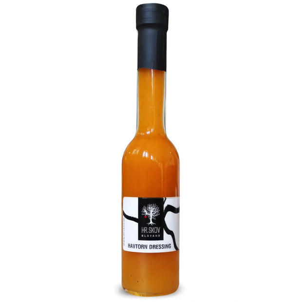 Flaske med Hr. Skov havtorndressing – frugtig dressing med æbler, havtorn (15%) og eddike, 20 cl, velegnet til salater, fisk, bowls og lette retter