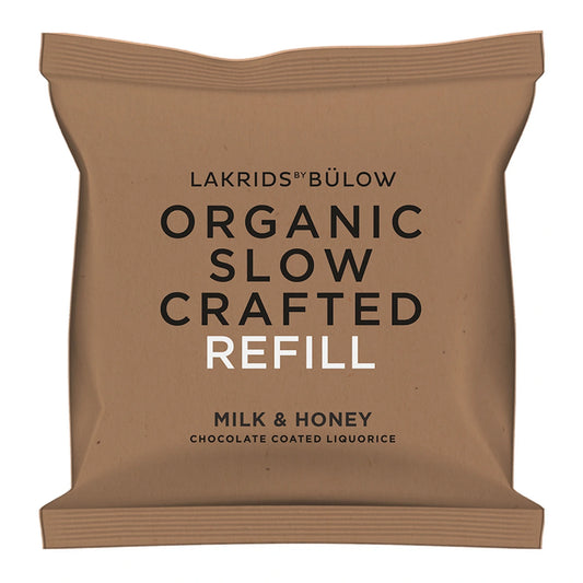 Lakrids by Bülow Milk & Honey Refill 265 g – refillpose med økologisk chokoladeovertrukket lakrids i mælkechokolade med honning og Maldon havsalt, til SLOW CRAFTED glas
