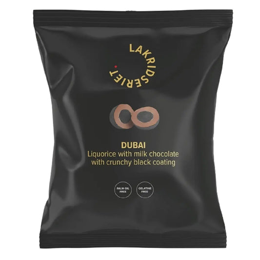 Lakridseriet Dubai lakrids med flødechokolade og sprød crunch i stor flowpose, 95 g
