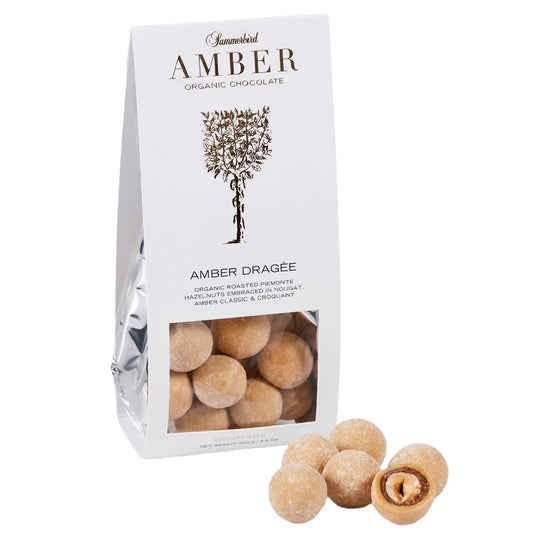 Summerbird Amber Dragée 100 g – økologiske dragéer med hasselnødder, nougat og knust krokant, overtrukket med gylden Amber Classic-chokolade med karamelliserede noter
