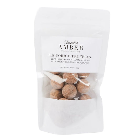 Summerbird Amber Liquorice Truffles 100 g – økologiske lakridstrøfler drageret med gylden Amber-chokolade, karamelliserede noter, vanilje og dyb lakridssmag