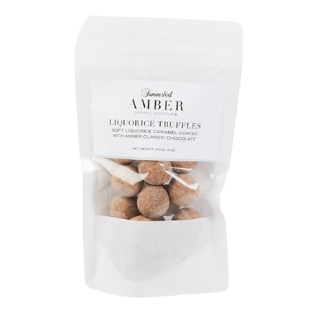 Summerbird Amber Liquorice Truffles 100 g – økologiske lakridstrøfler drageret med gylden Amber-chokolade, karamelliserede noter, vanilje og dyb lakridssmag