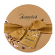 Summerbird Christmas Specialities gaveæske med 90 g økologisk chokolade i varianterne Blackcurrant, Piemonte og Amber Praliné med solbær, marcipan og hasselnødder