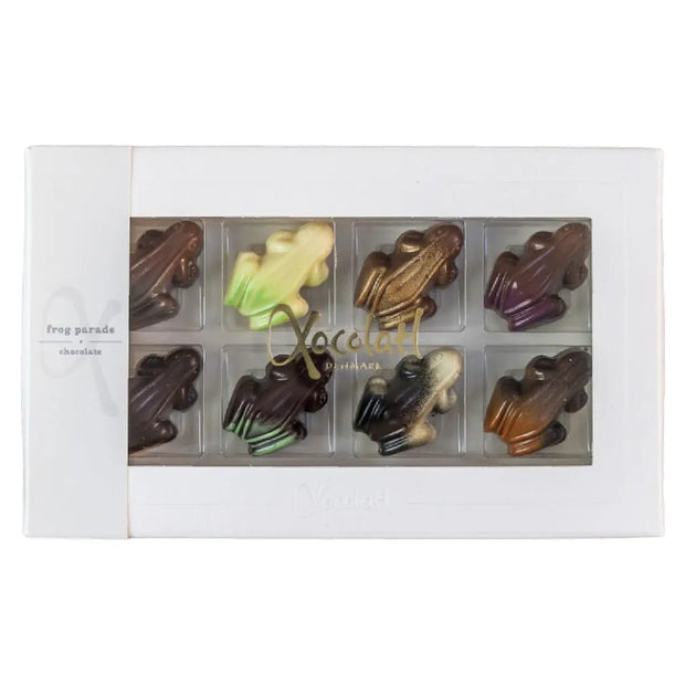 Xocolatl Frog Parade gaveæske med 8 fyldte chokoladefrøer med orange, nougat, passion, mint, lakrids og kaffe, 80 g