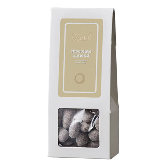 Xocolatl Nougat Mandler 90 g – sprøde dragéer med mandler og hasselnødder, chokolade, flormelis og havsalt, med soja lecithin og vanilje, opbevares tørt ved 15–18 grader