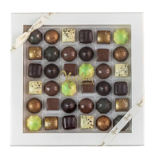 Xocolatl Premier cru 36 gaveæske med 36 fyldte chokolader – marcipan i mørk chokolade og fyld med appelsin, lakrids, mint, nougat, kokos, saltkaramel, citron og flødekaramel, ca. 330 g