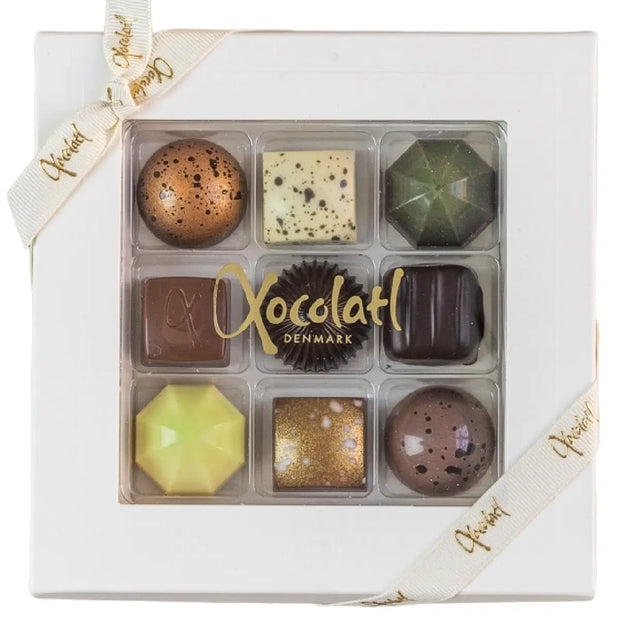 Xocolatl Premier Cru 9 85 g – gaveæske med 9 fyldte chokolader med blandt andet mandler, hasselnødder, citrus og lakrids, assorteret udvalg, opbevares ved 15–18 grader
