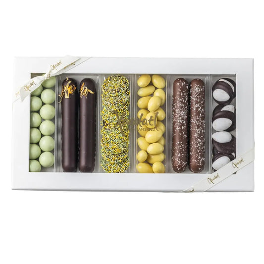 Xocolatl Spring Selection 340 g – gaveæske med fyldte chokolader og dragé, med mandler, kokos, citrus og passionsfrugt samt udvalgte varianter med vodka og Malibu, opbevares ved 15–18 grader